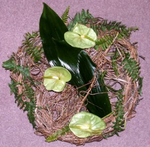Beautiful minimalistic wreath using just green and brown foliage.