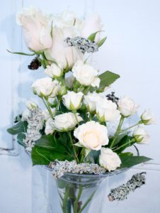 Stunning white vase display by Shrinking Violet